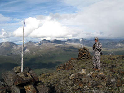 Scott beside the rock shrines