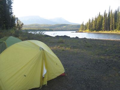 Tents setup on an island in Thutade Lake